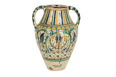 Lot 643 - A POLYCHROME-PAINTED CHEMLA POTTERY WATER JUG