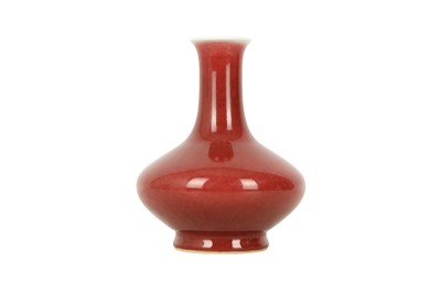 Lot 193 - A CHINESE COPPER RED-GLAZED BOTTLE VASE.