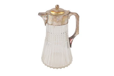Lot 31 - A LARGE GLASS AND SILVER PLATED WATER JUG, 20TH CENTURY
