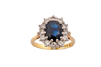 Lot 41 - A sapphire and diamond cluster ring