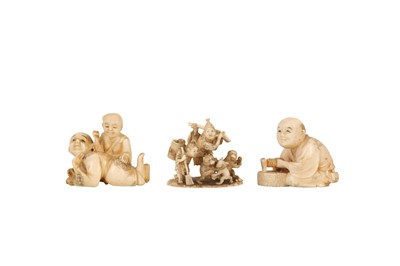 Lot 458 - λ THREE IVORY FIGURAL NETSUKE.