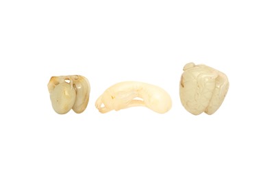 Lot 671 - THREE  CHINESE PALE CELADON JADE CARVINGS.