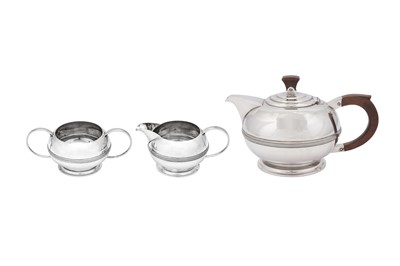 Lot 362 - A George VI sterling silver three-piece tea service, Birmingham 1948 by Albert Henry Jephcott and Albert Henry Jephcott Junior (first reg. 8th March 1920, this mark 15th March 1932)