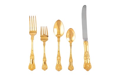 Lot 273 - A modern American sterling silver gilt table service of flatware / canteen, retailed by Ralph Lauren
