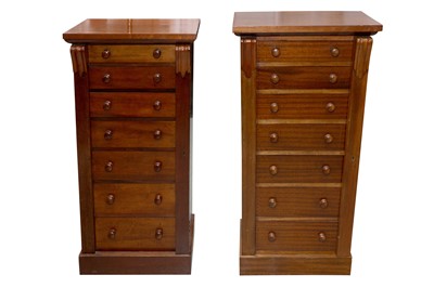 Lot 104 - A NEAR PAIR OF MAHOGANY WELLINGTON CHESTS
