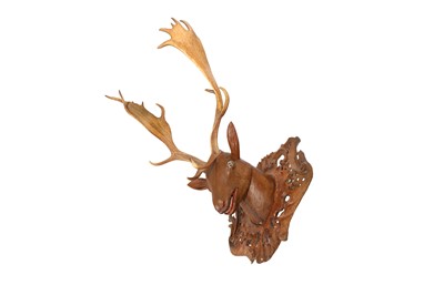 Lot 215 - A GERMAN BLACK FOREST PAINTED PINE AND ANTLER HUNTING TROPHY, 18TH CENTURY