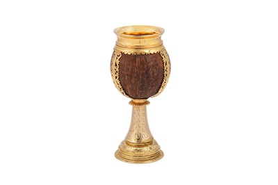 Lot 575 - A George V sterling silver gilt coconut cup, London 1928 by Carrington and Co