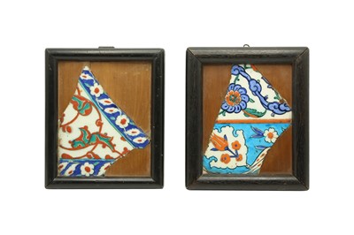 Lot 319 - TWO FRAMED FRAGMENTS OF IZNIK POTTERY TILES