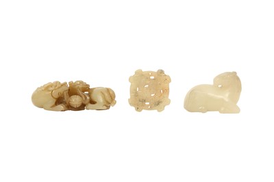 Lot 672 - A GROUP OF THREE CHINESE PALE CELADON JADE CARVINGS