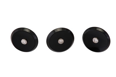 Lot 56 - A set of diamond and onyx shirt studs