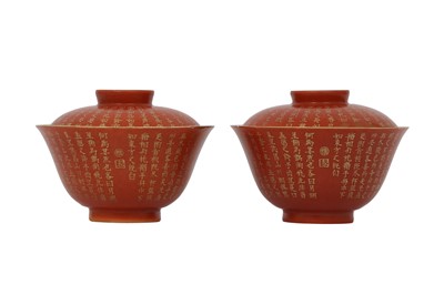 Lot 106 - A PAIR OF CHINESE IRON-RED GILT-INSCRIBED BOWLS AND COVERS.