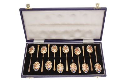 Lot 291 - A cased set of Elizabeth II sterling silver gilt and champlevé enamel teaspoons, Birmingham 1979 by Turner and Simpson