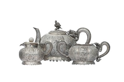 Lot 703 - A CHINESE THREE PIECE SILVER TEA SET.