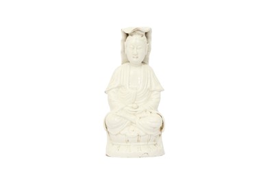 Lot 550 - A CHINESE BLANC-DE-CHINE FIGURE OF GUANYIN.
