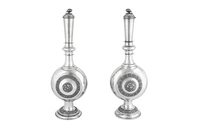 Lot 285 - A pair of late 19th / early 20th century Persian (Iranian) silver long necked bottles, Shiraz circa 1900
