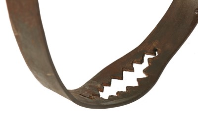 Lot 1027 - A WROUGHT IRON CHASTITY BELT, 20TH CENTURY