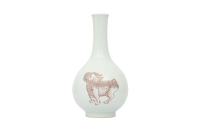 Lot 642 - A CHINESE UNDERGLAZE RED-DECORATED 'BEASTS' BOTTLE VASE.
