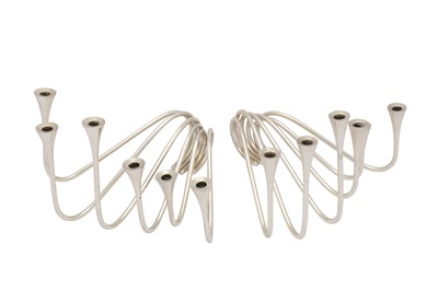 Lot 249 - A matched pair of mid-20th century Danish sterling silver modernist "Bolgeslag" The Waves candelabra, Copenhagen 1952/56 designed by Ibi Trier Mørch (1910-80) for Anton Michelsen