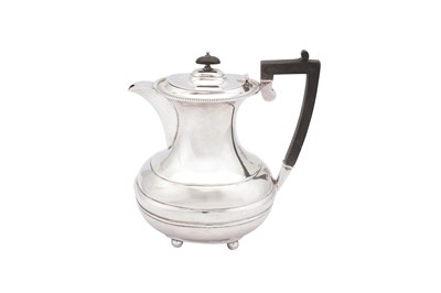 Lot 366 - A George V sterling silver hot water pot, Sheffield 1923 by William Hutton and Sons
