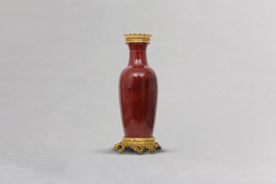 Lot 25 - A LARGE CHINESE ORMOLU-MOUNTED COPPER RED-GLAZED VASE.