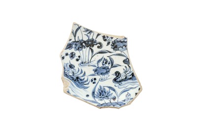 Lot 219 - A CHINESE BLUE AND WHITE 'LOTUS POND' BOWL SHARD.