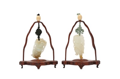 Lot 442 - TWO CHINESE PALE CELADON JADE 'BOYS' CARVINGS.