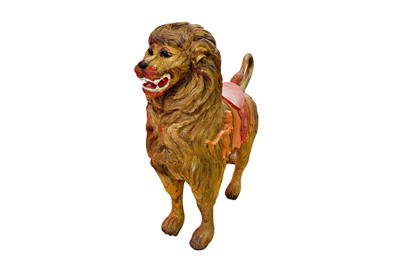 Lot 276 - A large carved wooden model of a lion, probably Indian, late 19th/Early 20th century