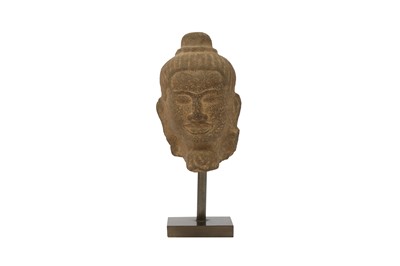 Lot 410 - A KHMER STONE HEAD OF A BUDDHA.