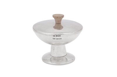 Lot 337 - An Elizabeth II sterling silver modernist covered bowl, London 1980/90 by MSB
