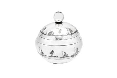Lot 180 - An early 20th century Iraqi silver and niello confectionary covered bowl, signed Omara Salem