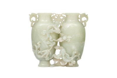 Lot 536 - A CHINESE PALE CELADON JADE DOUBLE 'CHILONG' VASE.