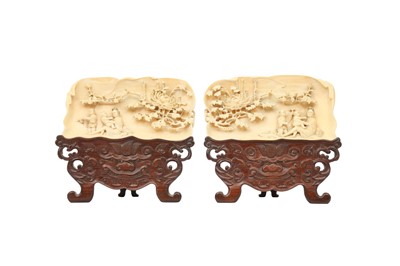 Lot 457 - λ A PAIR OF CHINESE CARVED IVORY WRIST RESTS.