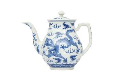 Lot 53 - A CHINESE BLUE AND WHITE TEAPOT AND COVER.