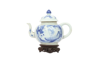 Lot 50 - A CHINESE BLUE AND WHITE TEAPOT AND COVER.