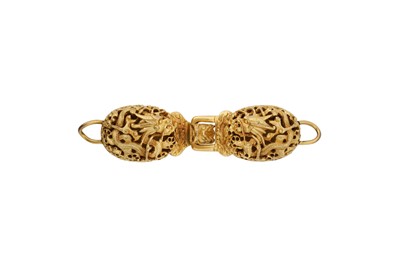 Lot 91 - A RARE CHINESE GILT-BRONZE ‘DRAGONS’ BELT SET.