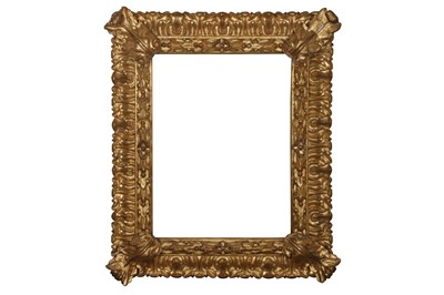 Lot 237 - AN IMPRESSIVE ITALIAN 17TH CENTURY BOLOGNESE CARVED AND GILDED REVERSE PROFILE FRAME