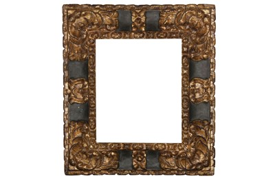 Lot 240 - A SPANISH 17TH CENTURY REVERSE PROFILE FRAME WITH CARVED AND GILDED CORNERS AND PAINTED SCOTIA CARTOUCHE