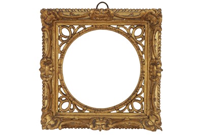 Lot 218 - AN ENGLISH 18TH CENTURY CARVED, PIERCED AND GILDED SWEPT FRAME