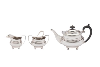 Lot 374 - A George V sterling silver three-piece tea service, Birmingham 1922 by Ernest Druiff & Co