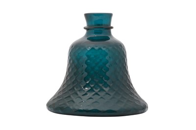 Lot 253 - A MUGHAL MOULDED DARK GREEN GLASS HUQQA BASE