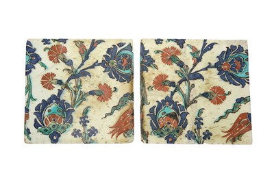 Lot 322 - TWO IZNIK POTTERY TILES WITH CARNATIONS, TULIPS AND LOTUS FLOWERS