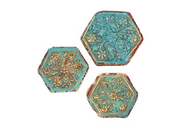 Lot 217 - THREE GILT AND TURQUOISE-GLAZED LAJVARDINA POTTERY TILES