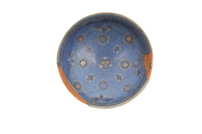Lot 210 - A SMALL MINA'I POTTERY BOWL ON COBALT BLUE GROUND