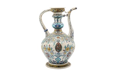 Lot 344 - A LARGE IZNIK-STYLE POTTERY SPOUTED EWER