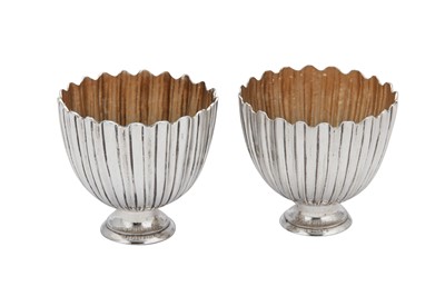 Lot 220 - A pair of early 19th century Austrian 13 loth (812 standard) silver zarfs, Vienna 1803 by Leopold Meixner (active 1800-34)