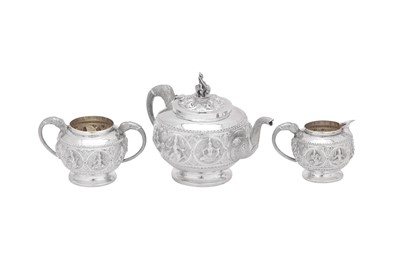 Lot 68 - An early 20th century Anglo – Indian unmarked silver three-piece tea service, Bombay circa 1920