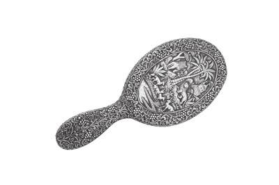 Lot 69 - An early 20th century Anglo – Indian unmarked silver hand mirror, Lucknow circa 1900