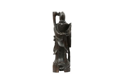 Lot 328 - A CHINESE WOOD FIGURE OF SHOULAO.