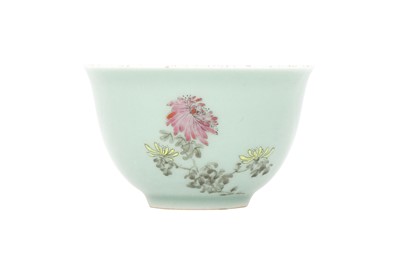 Lot 676 - A CHINESE FAMILLE ROSE CELADON-GROUND BOWL.