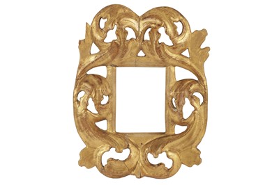 Lot 230 - AN ITALIAN VENETIAN 18TH CENTURY CARVED, PIERCED AND GILDED FRAME